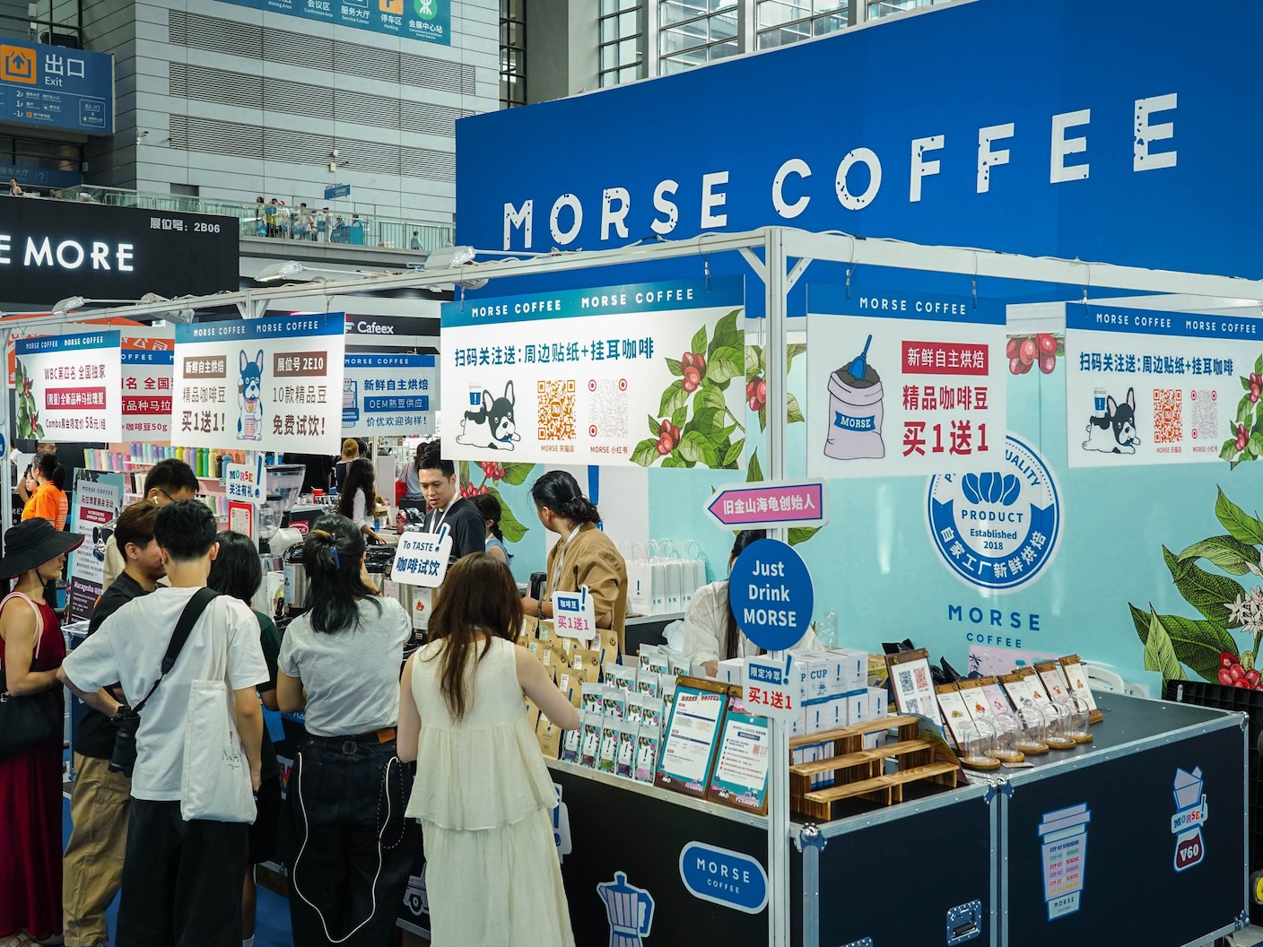 A Morse Coffee pop-up espresso bar serving guests at an outdoor community event.